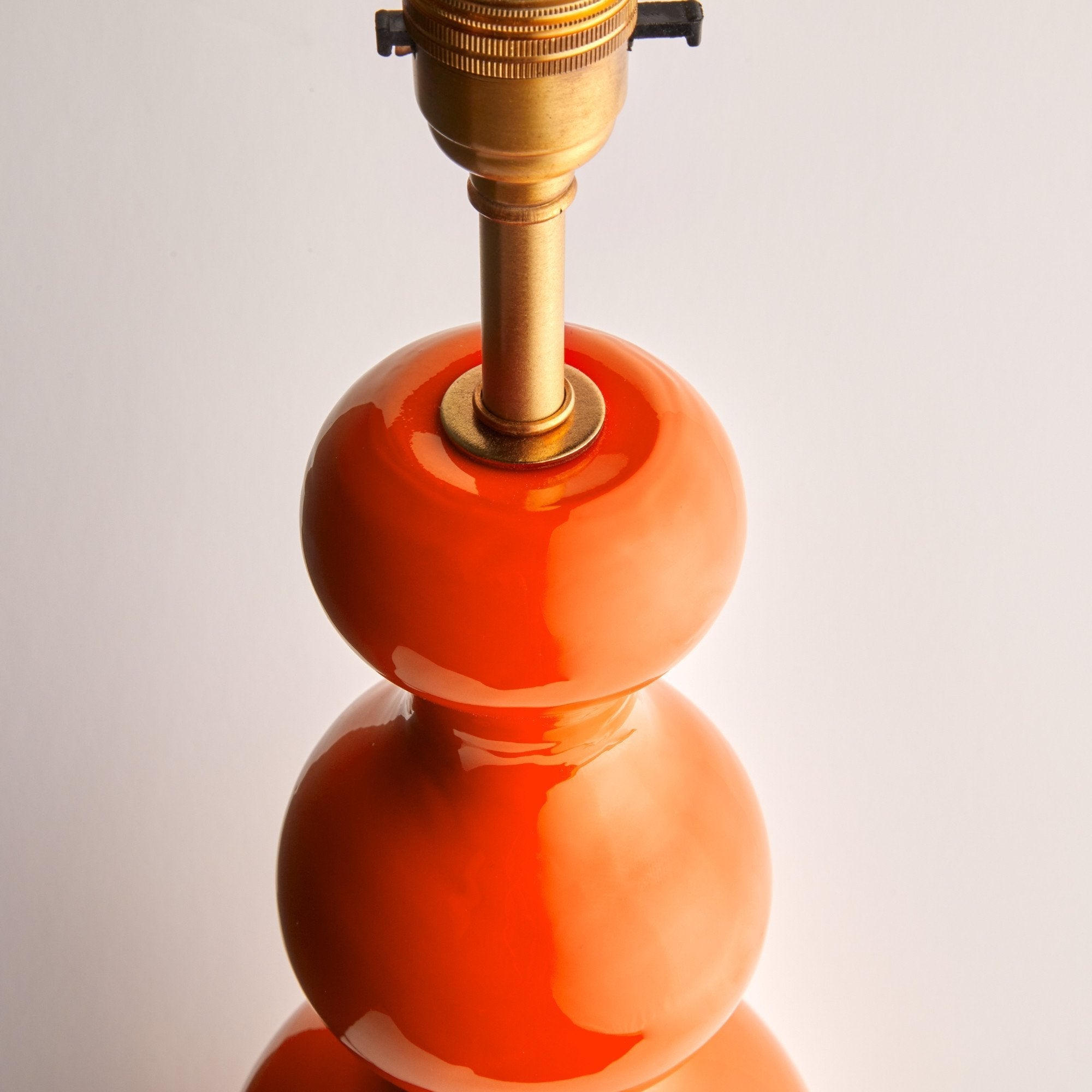 Larger Wobster table lamp in orange lacquered wood