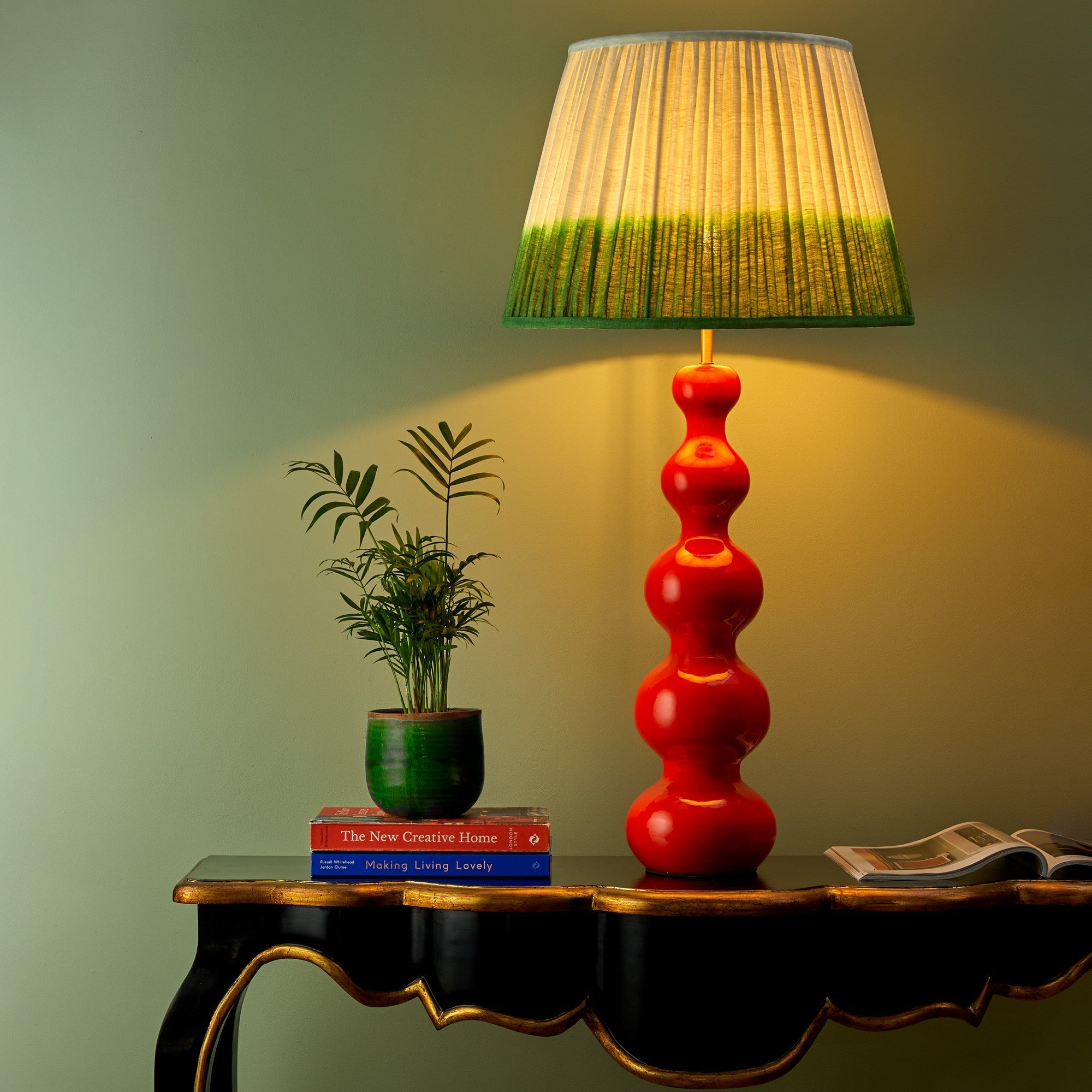 Larger Wobster table lamp in orange lacquered wood